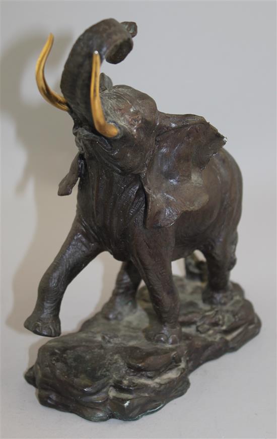 A 20th century patinated bronze elephant, 9.5in.